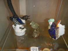 A USSR porcelain magpie and two other birds.