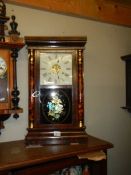 An early 20th century American wall clock, COLLECT ONLY.