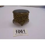 An early 20th century French trinket box with glass top.