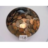 A quantity of old copper coins.