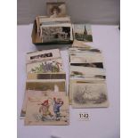 A mixed lot of old postcards.