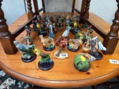 A quantity of birds & mythical beast figurines