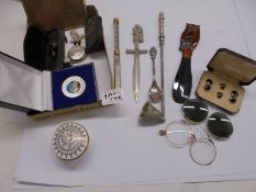 A mixed lot including letter openers, owl shoe horn, pince nez etc.