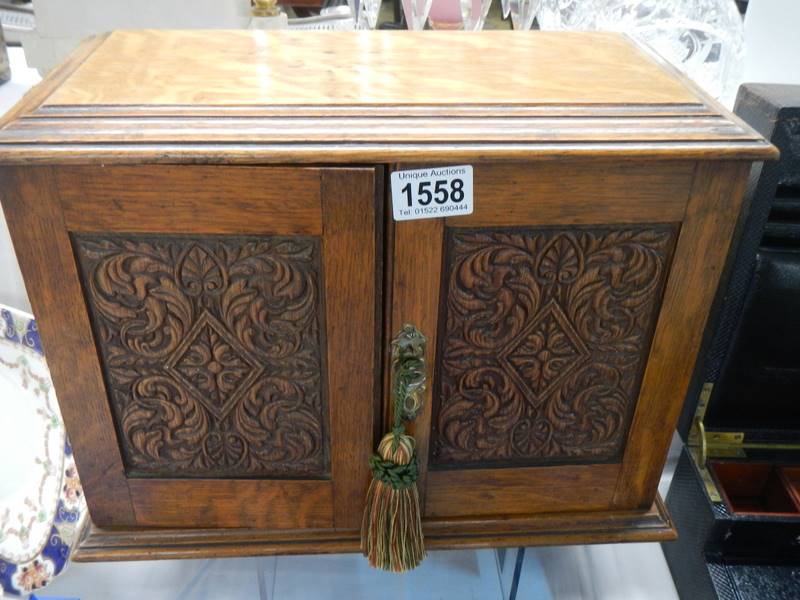 A smokers cabinet with carved doors, COLLECT ONLY. - Image 5 of 5