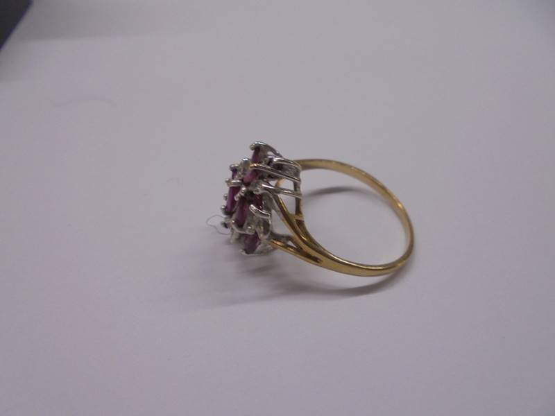 A diamond and amethyst yellow gold ring, size T, 3.1 grams. - Image 3 of 3