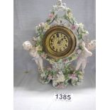 A porcelain boudoir clock.