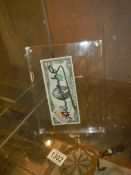 An Andy Warhol signed two dollar note with USA chemistry stamp in perspex frame with certificate