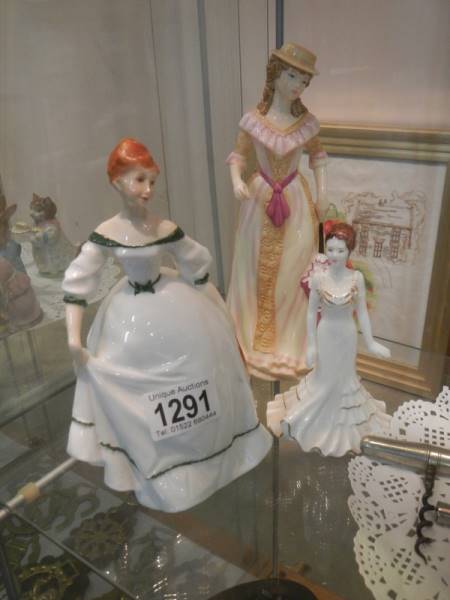 A Royal Worcester figurine, a Royal Doulton figurine and a Coalport figurine.