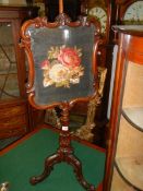 A Victorian rosewood and tapestry pole screens, COLLECT ONLY.