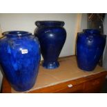 A good set of three large blue glazed earthenware pots, COLLECT ONLY.