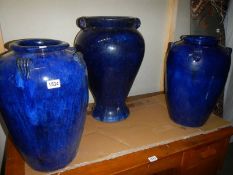 A good set of three large blue glazed earthenware pots, COLLECT ONLY.