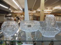 A large cut glass fruit bowl, basket, jug and two vases. COLLECT ONLY.