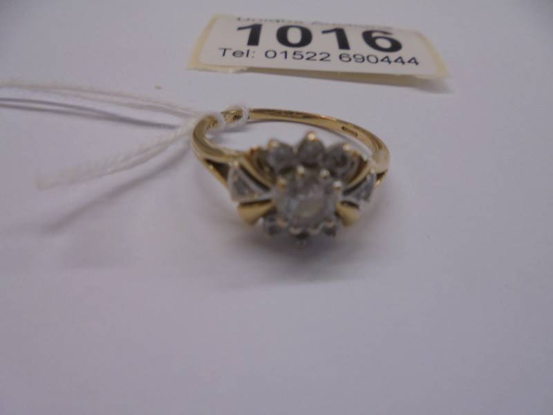 A yellow gold cluster ring, marked 10k, size Q, 3.2 grams. - Image 2 of 3