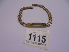A gold identity bracelet set diamond chip and engraved DAVID, marked Italy 375, 11.1 grams.