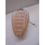 An Art Deco pink glass hanging lamp shade with chrome fittings.