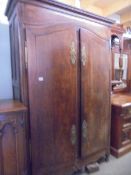 A 19th century wardrobe with brass fittings, for restoration, COLLECT ONLY.
