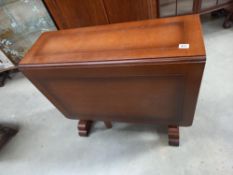 A mid 20c drop leaf table COLLECT ONY