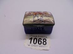 An early Victorian enamel patch box featuring a wrestling scene, 5 x 4 x 3 cm.