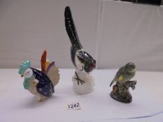 A USSR porcelain magpie, a Barmouth pottery greenfinch and a Bellwood Studios chicken.