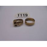A 9ct gold buckle ring size Q and a 9ct gold wedding ring size T, 7.8 grams total.
