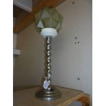 An art deco chrome barley twist table lamp with cubist green glass shade.