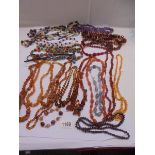 A good lot of assorted bead and stone necklaces.