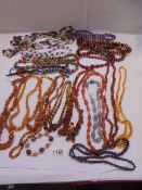 A good lot of assorted bead and stone necklaces.