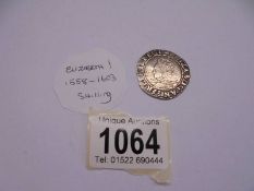 A Queen Elizabeth I 1558 - 1603 silver shilling.