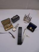 A mixed lot including toast rack, Jameson paper clip, wrist watch, buttons etc.,