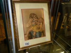 A framed and glazed print of an old man with a child.