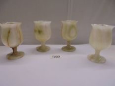 Four onyx goblets.