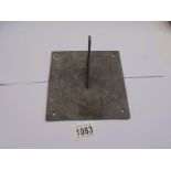 An antique brass sundial.