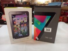 A Samsung Galaxy tab and a nexus 7c in boxes (untested) no leads for Nexus