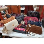 A good selection of ladies modern and vintage handbags, umbrellas, scarf, purse etc