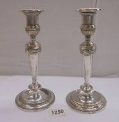 A pair of Regency style silver plate candlesticks, 25 cm.