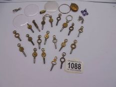 A quantity of pocket watch keys etc.,