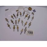 A quantity of pocket watch keys etc.,