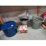 A large enamel saucepan, 3 pails (2 of which have round bottoms, so possibly fire pails) and a boxed