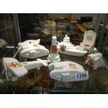 A selection of military related crested china (one tank, battleship and plane a/f).