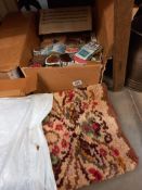 A box of vintage readicut wool for rug making