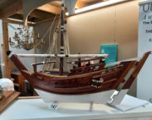 A wooden model of a boat COLLECT ONLY