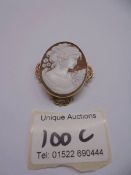 A cameo brooch with fancy 9ct gold openwork mount, in good condition.