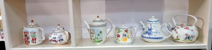 A collection of 6 teapots celebrating the artistry of the earliest teapots, fine bone china for