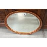 A vintage oval gilt framed bevel edged mirror COLLECT ONLY