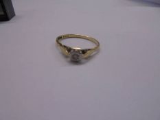 An 18ct gold single stone diamond ring, HM Birmingham 1872, size K half, 1.58 grams.