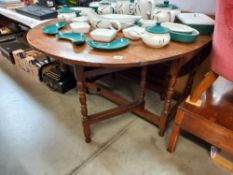 A 1930's large oak gateleg table COLLECT ONLY