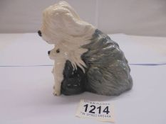 A Beswick Old English sheep dog with puppy.