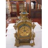 An early 19th century French enamel and gilt mantel clock in working order.