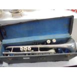 A cased French 'Covesnon Et Cie' trumpet.