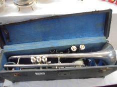 A cased French 'Covesnon Et Cie' trumpet.